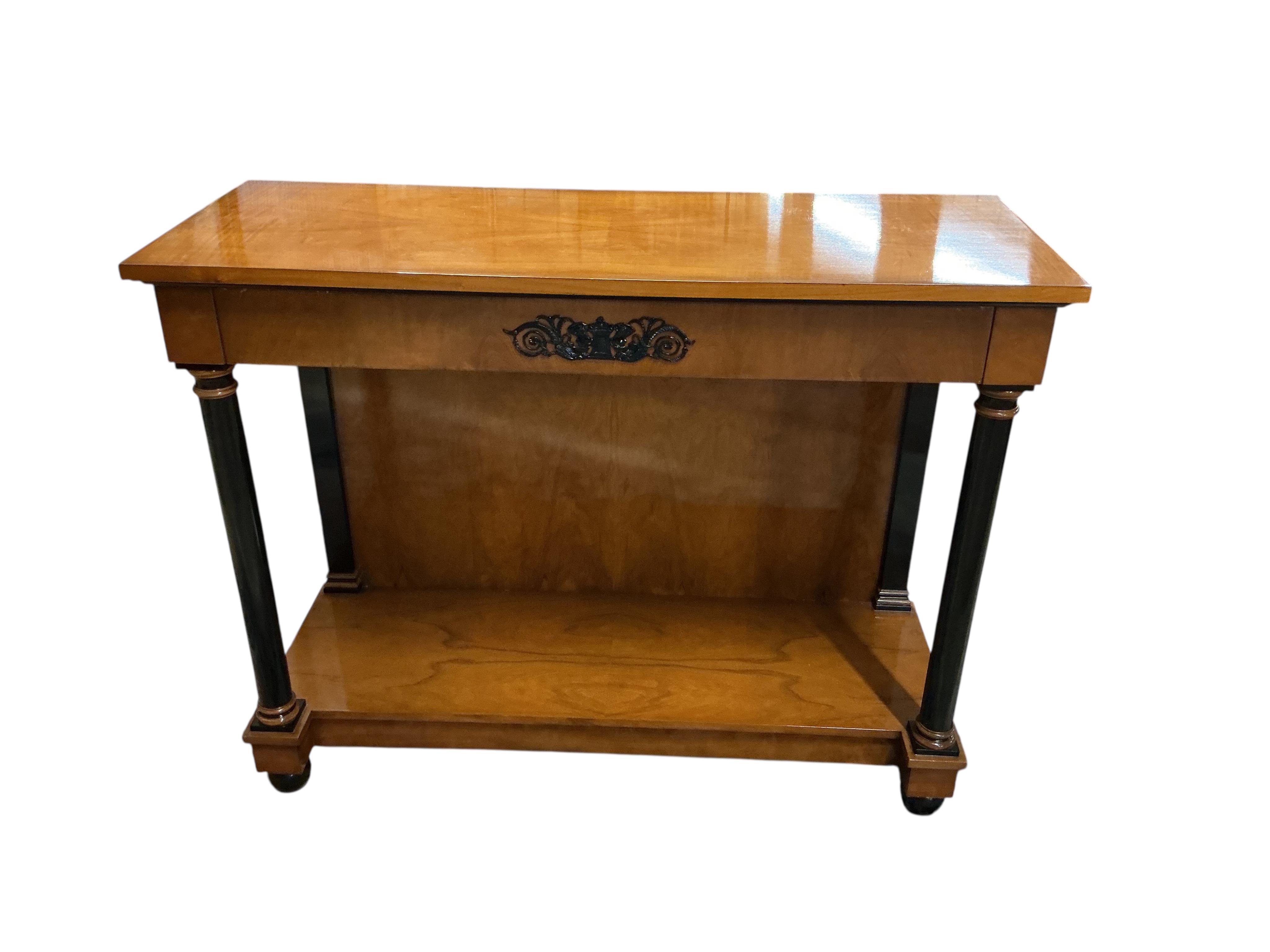 A pair of Biedermeier style cherry two tier console tables, with frieze drawers, width 110cm, depth 42cm, height 86cm